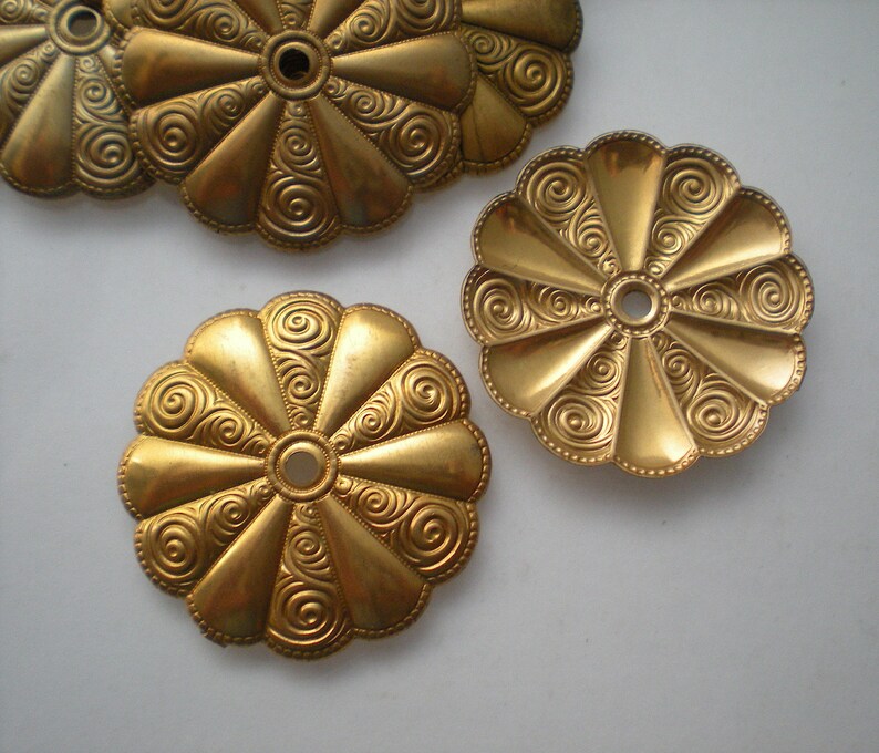 No 15-Large 12 brass mirror rosettes