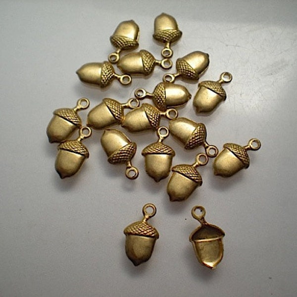 18 tiny brass acorn charms