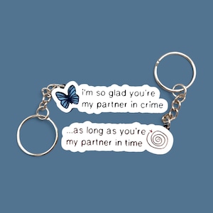 Life Is Strange Matching Keyrings: Partner In Crime/Time Graffiti Charms