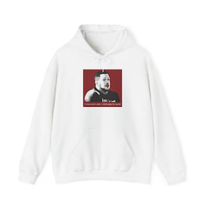 May include: White hooded sweatshirt with a front pocket and a drawstring. The sweatshirt features a graphic of a man on a red background. The text on the graphic reads: "I would never order a whole pizza for myself!"