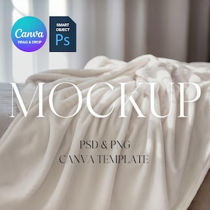 May include: A cream-coloured blanket is draped over a surface, with the word "MOCKUP" in large, elegant letters across the centre. The text "PSD & PNG CANVA TEMPLATE" is below. Canva and Photoshop logos are in the upper left.