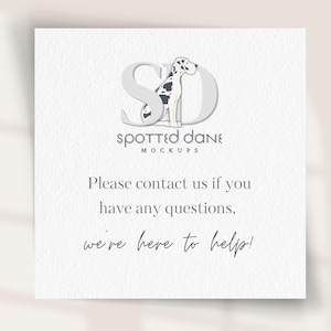 a white card with a black and white dog on it