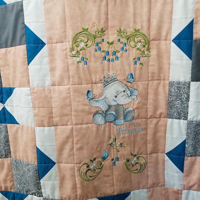 peach and white with machine embroidered center panel grays Little Princess 44 x 56 quilt in teal