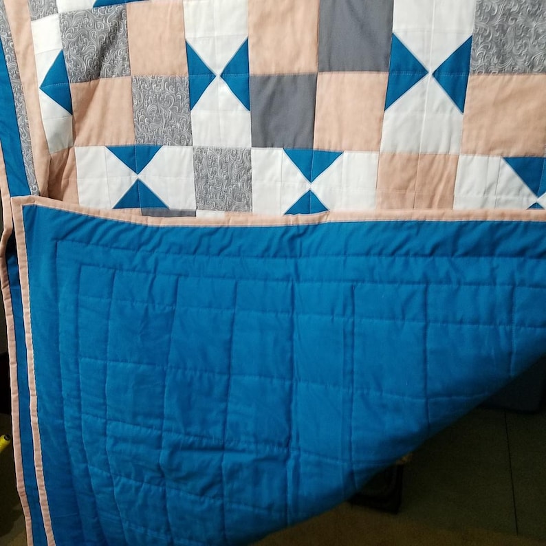 peach and white with machine embroidered center panel grays Little Princess 44 x 56 quilt in teal