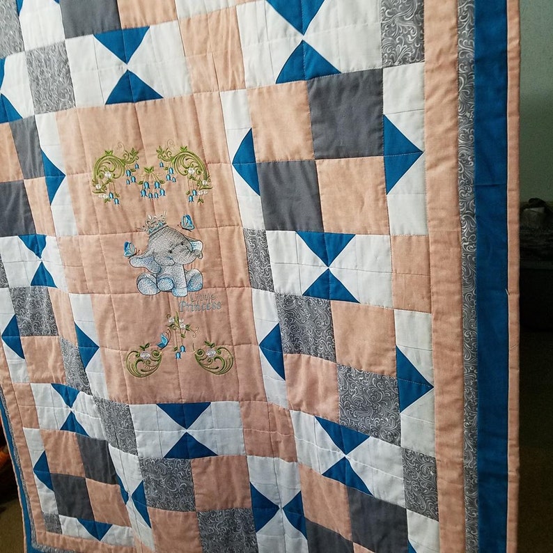 peach and white with machine embroidered center panel grays Little Princess 44 x 56 quilt in teal