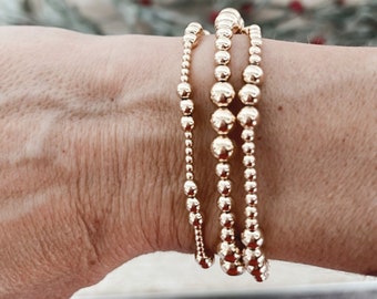 Gold Stacking Bracelets / Layering Bracelets / gold Stretch bracelets / 14k Gold filled / waterproof