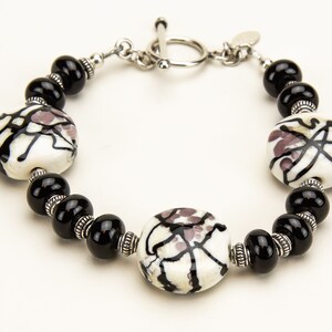 Lampwork Glass Bead Ivory, Light Purple and Black Bracelet