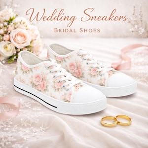 May include: White canvas sneakers with a floral rose pattern, white laces, and a white toe cap. The shoes are labeled "Wedding Sneakers" and "Bridal Shoes". Two gold wedding bands are in the foreground.