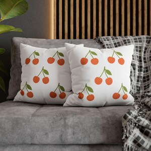 Funda de almohada minimalista con vibrantes tonos cereza: acogedora funda de cojín de verano para la decoración del hogar, elegante accesorio para el sofá.