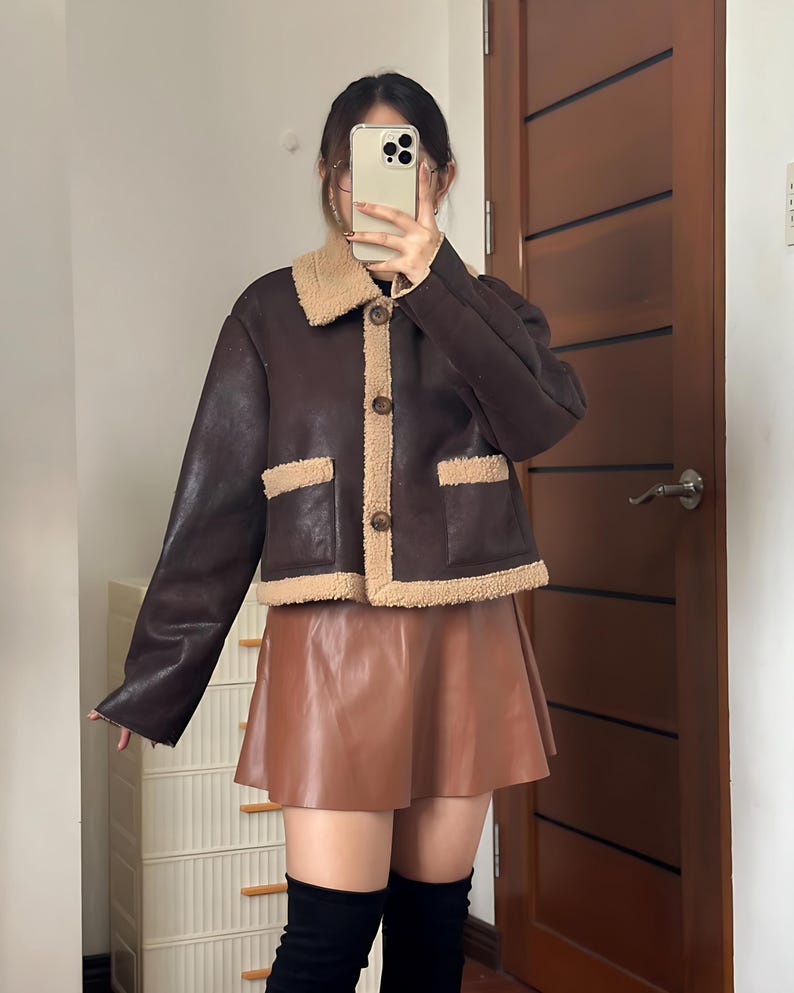 Women’s Winter Sheepskin Jacket, B3 Aviator Leather Bomber, 70s Vintage Style Coat, Brown Shearling Jacket, Cozy Fur Collar Flight Coat, Retro Leather Bomber Women, Authentic B3 Sheepskin Jacket, Women’s Classic Flight Outerwear, Handmade Winter Shearling, Warm Brown Bomber Coat, Soft Fur Lined Jacket, Retro 1970s Leather Jacket, Timeless Sheepskin Fashion, Vintage Leather Pilot Jacket, Stylish Cold Weather Coat, Women’s Real Leather Jacket, Flight Style Bomber, Elegant Brown Shearling