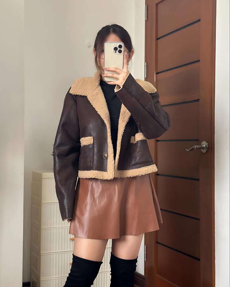 B3 Aviator Jacket Women, Shearling Leather Bomber, Brown Sheepskin Jacket, Vintage Pilot Jacket, Warm Winter Coat Women, 70s Inspired Jacket, Real Fur Collar Jacket, Retro Bomber Jacket, Cozy Flight Jacket Women, Winter Sheepskin Bomber, Women’s Leather Flight Coat, Sheepskin B3 Bomber, 70s Vintage Coat Women, Brown Fur Jacket, Leather Winter Outerwear, Handmade Leather Coat, Soft Shearling Jacket, Stylish Flight Coat, Warm Brown Aviator, Fur Trim Leather Bomber, Women’s Cold Weather Coat