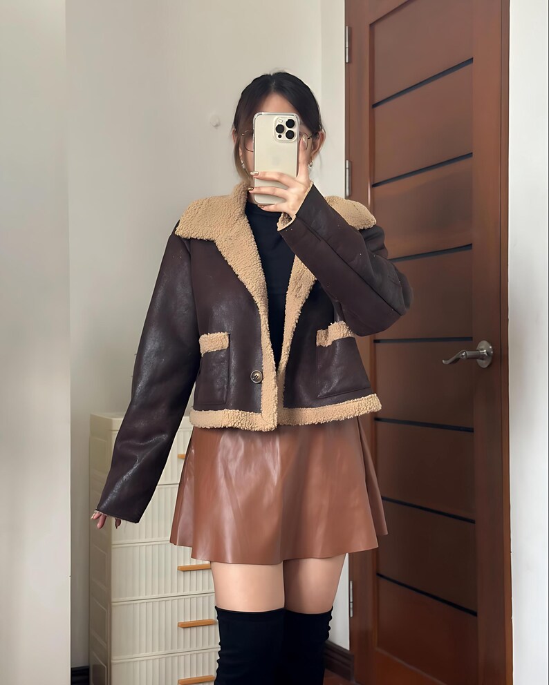 Retro Shearling Aviator Jacket, B3 Flight Bomber Coat, Sheepskin Leather Jacket Women, Fur Lined Vintage Bomber, Classic B3 Jacket for Women, Brown Shearling Coat, Warm Fur Collar Coat, 70s Flight Fashion, Stylish Pilot Jacket Women, Cozy Sheepskin Bomber, Retro Winter Outerwear, Brown Leather Shearling Jacket, Timeless Vintage Style Jacket, Warm Lined Leather Bomber, Elegant Women’s Aviator Coat, Brown Bomber for Cold Weather, Premium Leather Flight Jacket, Handmade Fur Jacket