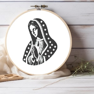 May include: Black and white illustration of the Virgin Mary with a star-patterned robe, praying with her hands clasped.