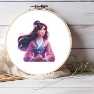 May include: A cross-stitch pattern of a woman with long dark hair wearing a purple and blue dress. The woman is looking to the right and has a gentle expression on her face.