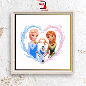 May include: A cross-stitch pattern featuring two female figures with blonde and auburn hair, and a small snowman character. They are positioned within a heart-shaped frame formed by blue and pink water splashes, with their hands forming a heart shape.