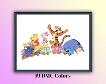May include: A framed cross-stitch pattern featuring Winnie the Pooh, Piglet, Tigger, and Eeyore riding in a colourful toy train. The characters are rendered in 19 DMC colours against a white background, with the text 19 DMC Colours printed below.