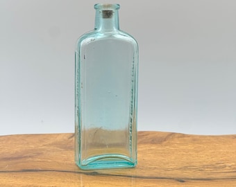 Three in One Oil Co Turquoise Bottle 5.5"