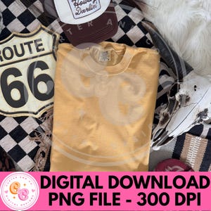 May include: Mustard yellow crewneck sweatshirt with a Route 66 sign and a trucker hat that says "Howdy Darlin". The image also includes a cow skull and the text "DIGITAL DOWNLOAD PNG FILE - 300 DPI".