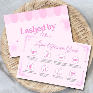 May include: Pink printed cards with the text "Lashed by" and "Lash Aftercare Guide" on a woven tray. The guide includes aftercare instructions with icons and text, such as avoiding water and oil-based products.