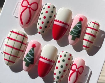 Uñas postizas personalizadas: Uñas de gel festivas para las fiestas, uñas postizas navideñas rosas y rojas, set de manicura de lunares.