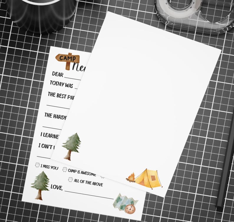 May include: A printable letter writing template with a camp theme. The template has a handwritten title "Camp News" and includes a list of prompts for writing a letter, such as "Dear", "Today was", "The best part", "The hardest part", "I learned", "I can't wait to", "I miss you", "Camp is awesome", "All of the above", and "Love". The template also includes illustrations of a pine tree, a tent, and a compass.