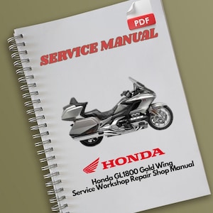 Pode incluir: Manual de serviço com encadernação em espiral para uma motocicleta Honda GL1800 Gold Wing. A capa apresenta uma imagem detalhada da motocicleta em prata e preto, com o logotipo da Honda e as palavras "SERVICE MANUAL" em vermelho.