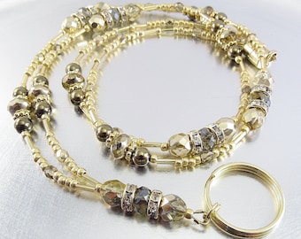 Cordón para identificación: porta credencial con cuentas de cristal checo dorado, estrás y hematita de bronce, collar con credenciales.