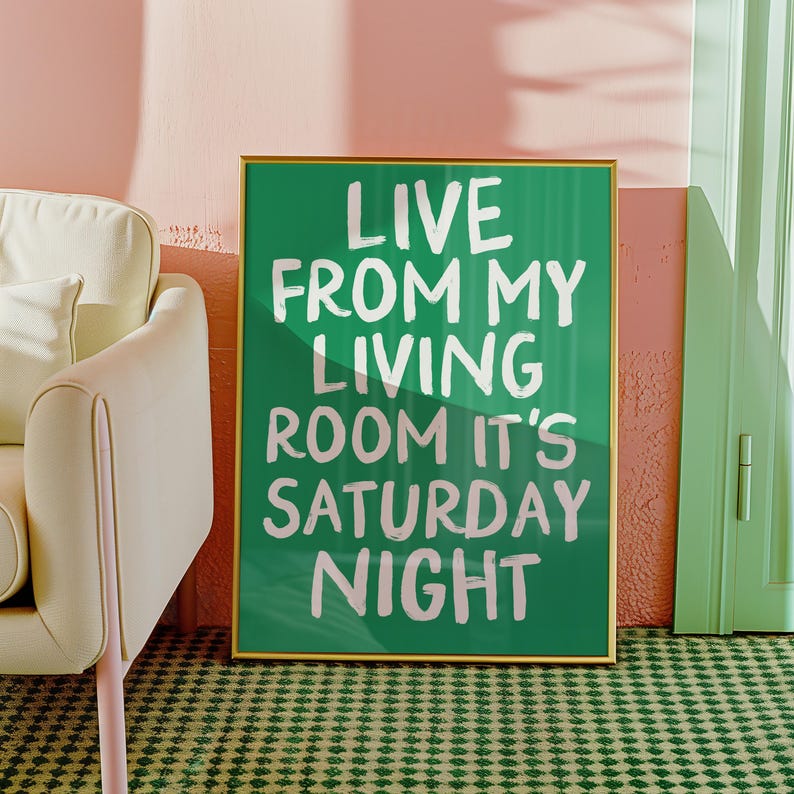 May include: A green poster with white text that reads "Live from my living room it's Saturday night".