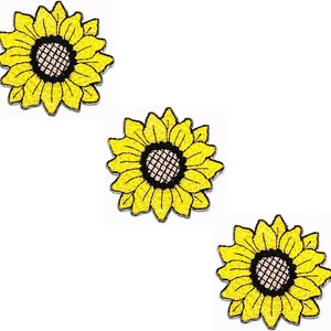 May include: Three yellow embroidered sunflower iron-on patches. Each patch features a black center with a white grid pattern.
