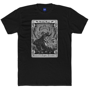 Puede incluir: Camiseta negra con un diseño gráfico. El diseño presenta el texto "The Slim Reaper" sobre una ilustración de una figura con una guadaña. Debajo de la ilustración está el texto "Steelers VS. Eagles / December 15".