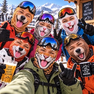 May include: Five people wearing animal-themed balaclavas and ski goggles. The balaclavas feature dog, cat, fox, tiger, and bear faces with tongues out. One person holds a glass with the text 'GOOD FRIENDS HIGHER ALTITUDES' and another holds a mug with 'LIFE IS BETTER IN THE MOUNTAINS'.