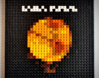 Arte con ladrillos amarillos para construir