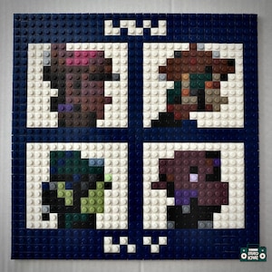 Puede incluir: Una obra de arte en mosaico cuadrado hecha de ladrillos Lego azules, blancos y de varios colores. La obra presenta cuatro diseños de ojos, cada uno en un cuadrado con borde blanco separado. Los ojos son marrones, verdes y morados, con un acento rosa.