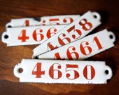 vintage enamel number or plaque, 4-digit red on white, from Belgium