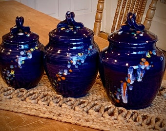 3 Cobalt canisters with orange, yellow, turquoise and white crystals