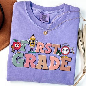 Comfort Colors® First Grade Teacher Shirt, Back to School 1st Grade Tee, Teacher Appreciation Gift, Cute Elementary School, Coquette Bow