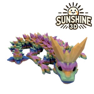 May include: A colorful 3D-printed dragon figurine with a rainbow gradient of colors, including blue, green, purple, and orange. The dragon has a spiky back and large, pointed horns. The text "SUNSHINE 3D" is in the upper right corner.