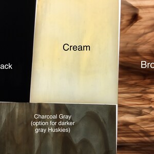 May include: Color swatches for fabric in black, cream, charcoal gray, and brown. The charcoal gray swatch has the text "Charcoal Gray (option for darker gray Huskies)".