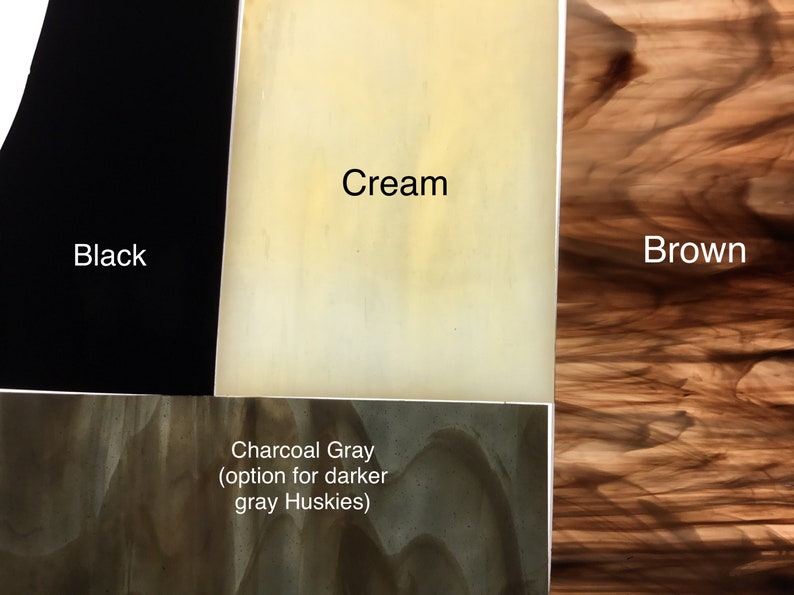 May include: Color swatches for fabric in black, cream, charcoal gray, and brown. The charcoal gray swatch has the text "Charcoal Gray (option for darker gray Huskies)".