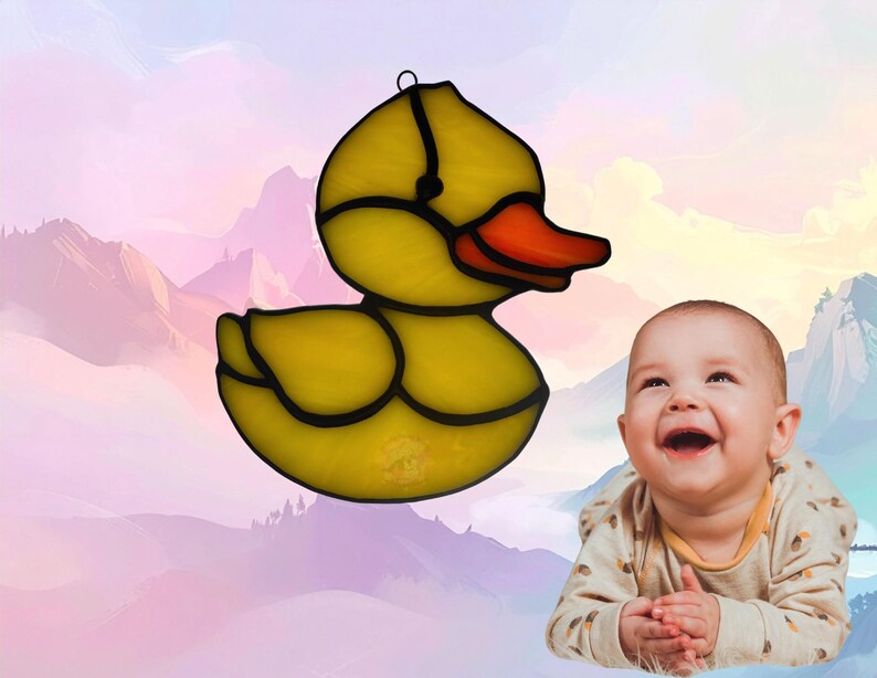 Baby Animal Duckling. Made of beautiful yellow and orange glass. Duckling represents May.