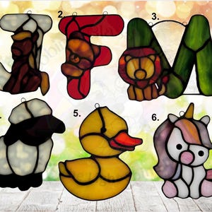 Baby Animals representing birth months. January- Horse, February- Bear, March-Lion, April- Lamb, May- Duckling, June- Unicorn.