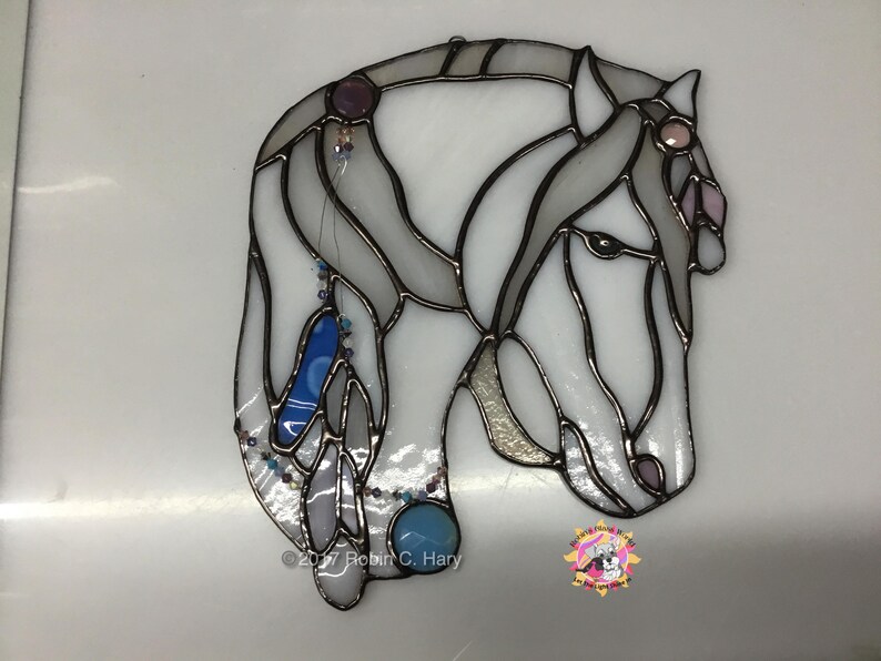 Spirit Horse suncatcher- White- shown on light box- light off.