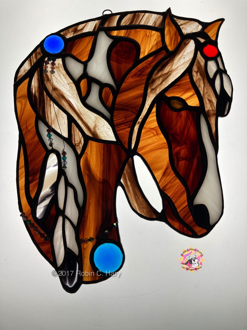 Spirit Horse suncatcher- Brown- on light box, light on.