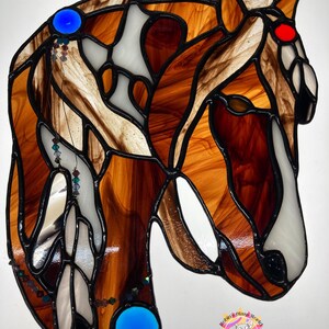Spirit Horse suncatcher- Brown- on light box, light on.