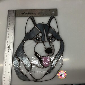 Siberian Husky Suncatcher with rulers for size reference.