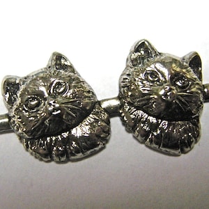 Metal stamping of a Pair of Cats