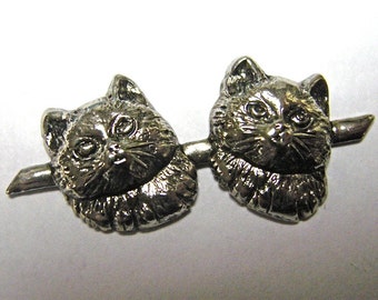 Metal stamping of a Pair of Cats