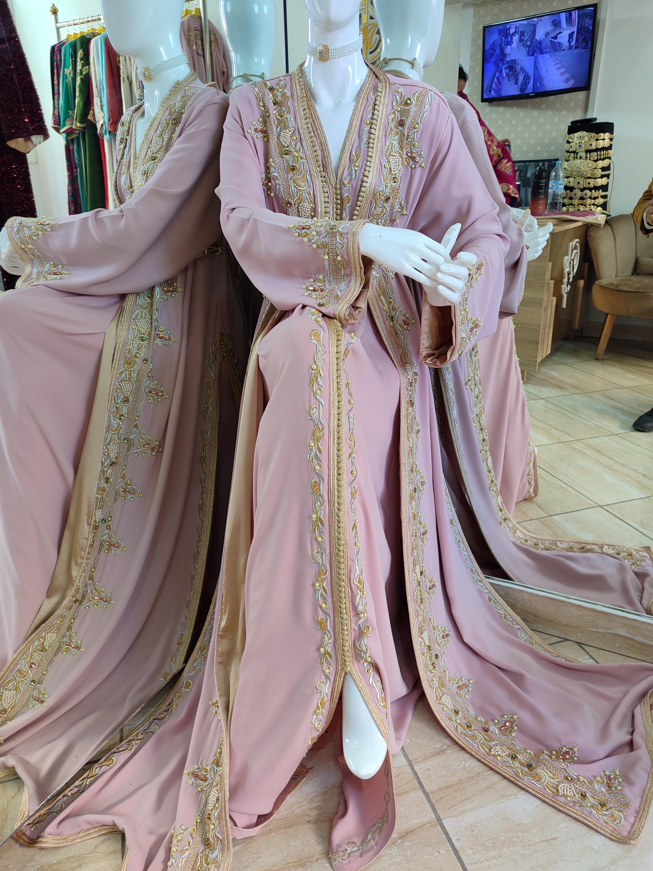 sachin and babi light blue dress Marrying Love and Fashion: Wedding Dresses in Morocco main image 1