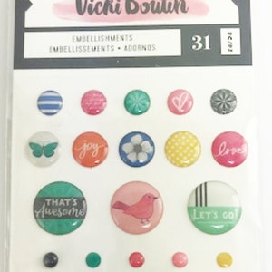 May include: A sheet of 31 colorful, round, and rectangular stickers with various designs and text. The stickers include a butterfly, a bird, a flower, and words like "joy", "love", "that's awesome", "let's go", "my happy place", "fun starts here", and "do it with a smile".