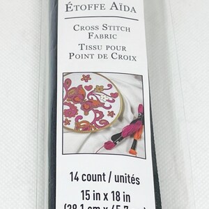 May include: Aida cloth for cross stitch, 14 count, 15 inches by 18 inches (38.1 cm by 45.7 cm).